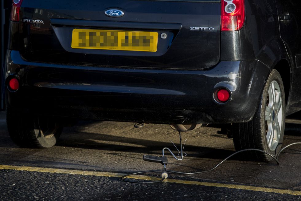 A car undergoing an MOT test