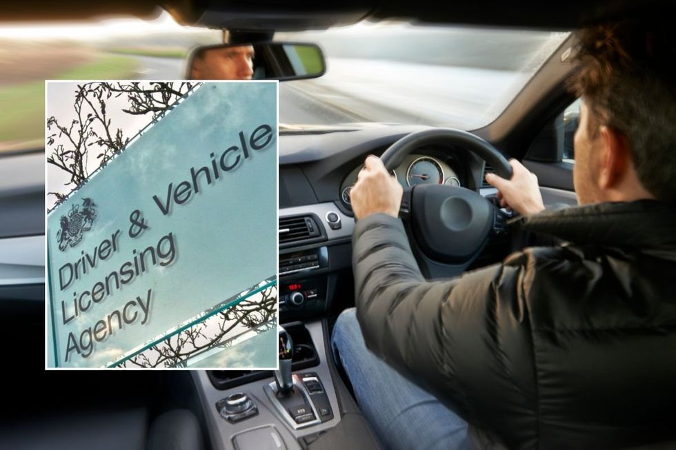 A DVLA sign and a man driving in a car