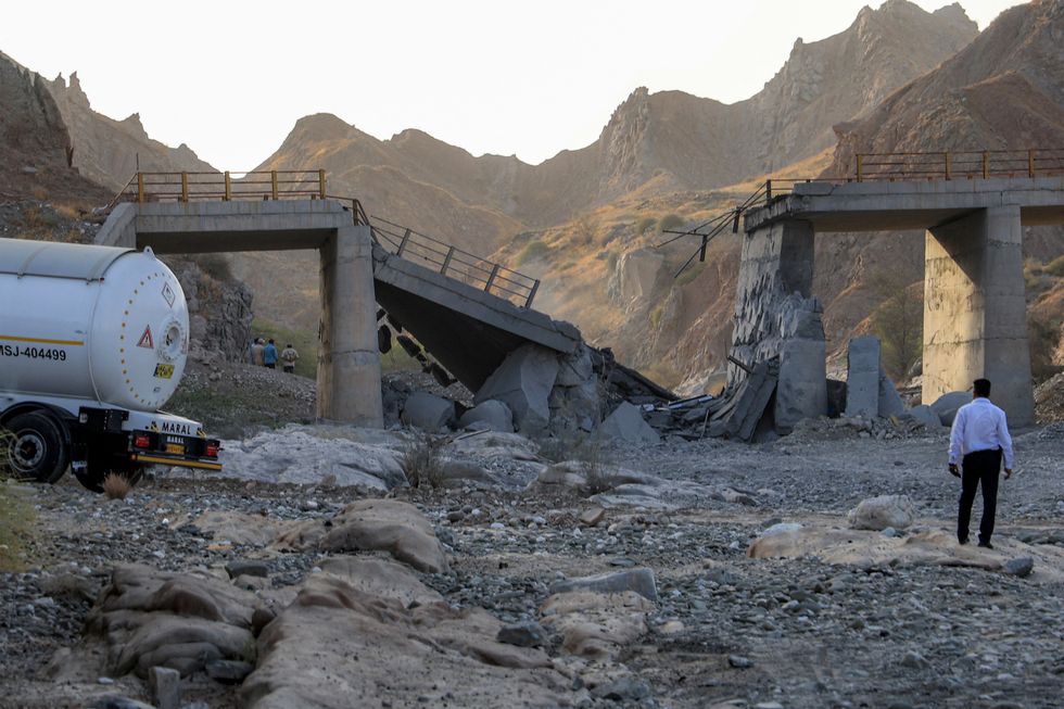 A heavily-damaged bridge which was hit by a US strike is pictured along the road connecting Roudan and Bandar Abbas in southern Iran