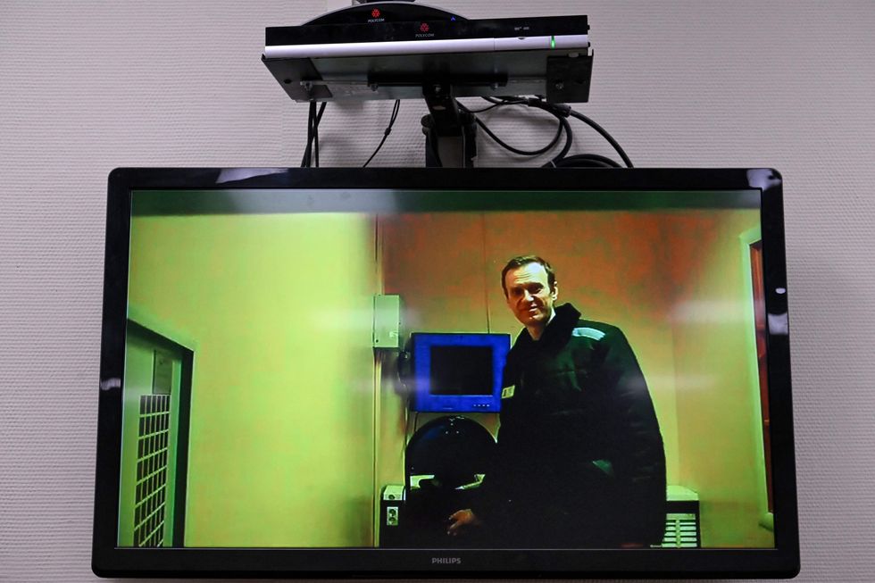 A man appearing in court via video link
