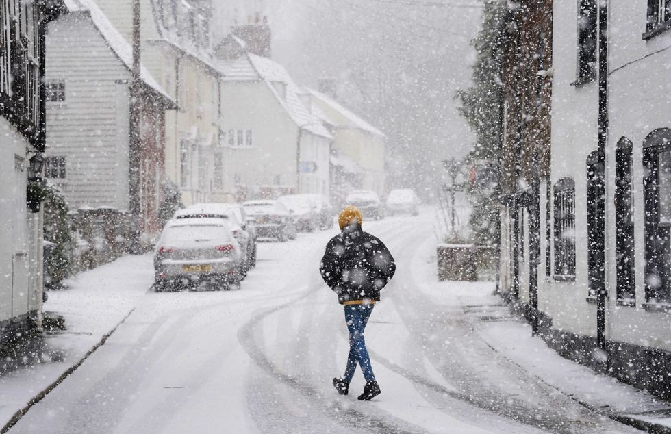 A man walking in snow