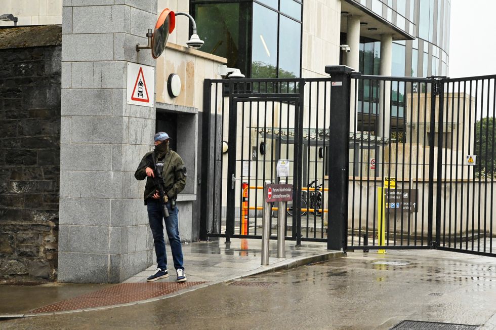A member of the Garda stands outside the Special Criminal Court where alleged Irish crime gang boss Daniel Kinahan is due to appear on charges of organised criminal activity