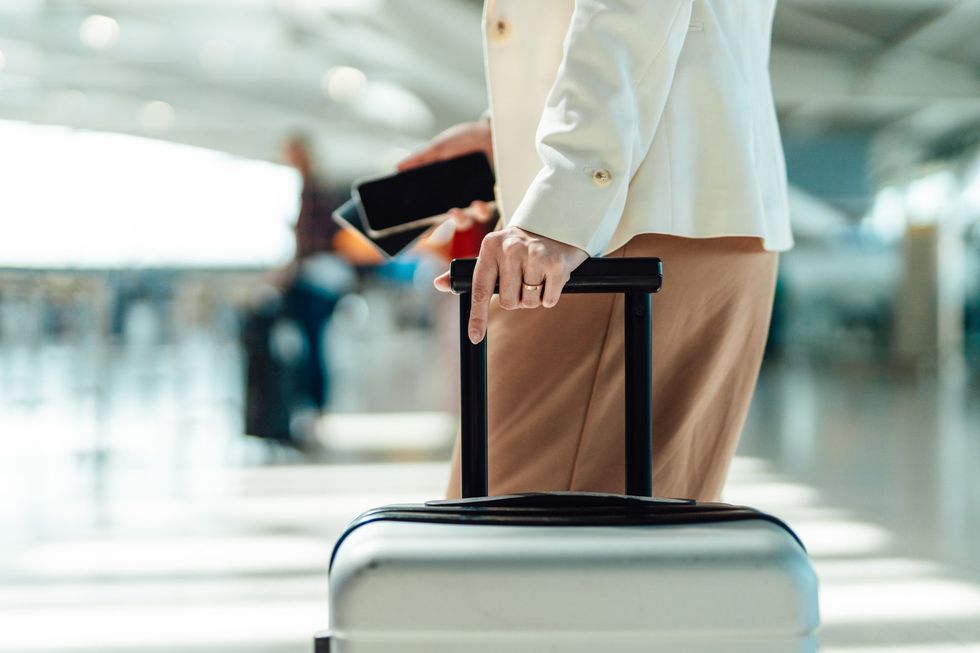 A person with a suitcase