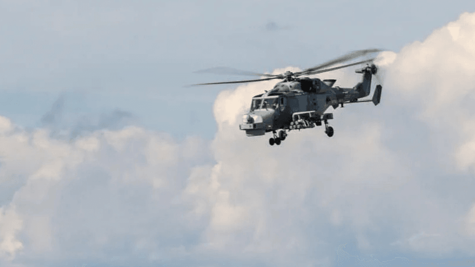 A Royal Navy Wildcat helicopter airborne