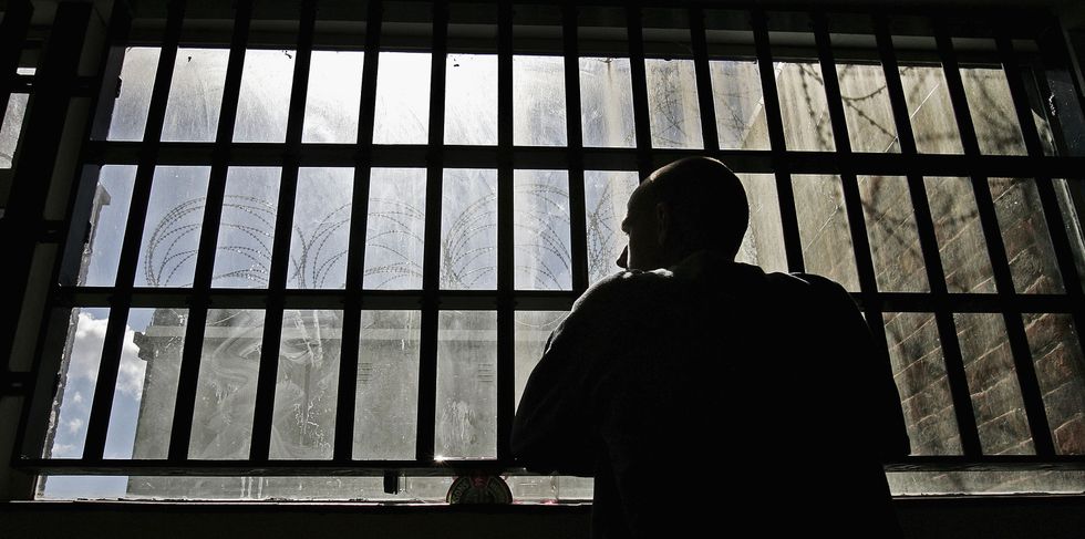 A stock image of a prisoner