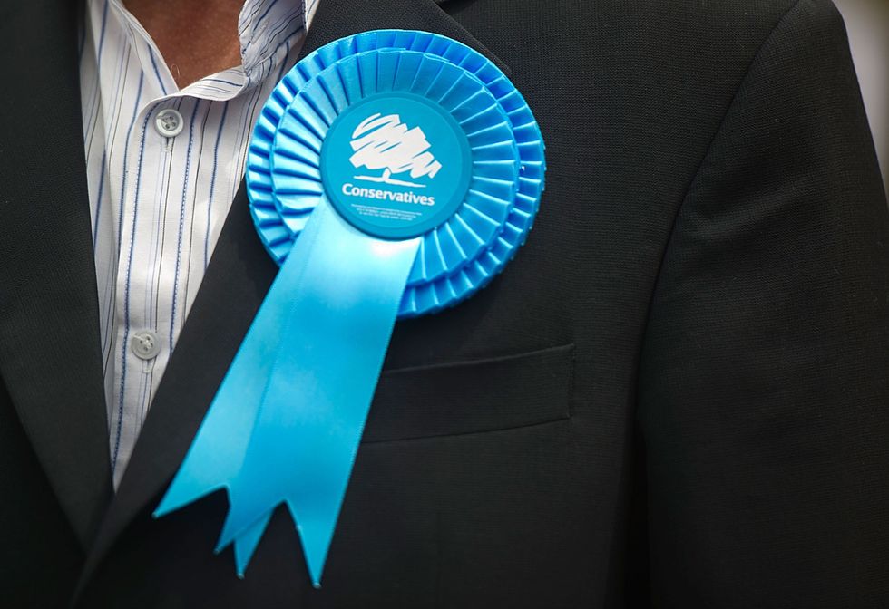 A supporter's Conservative rosette