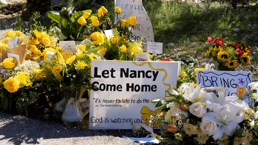 A tribute to Nancy Guthrie which reads 'let Nancy come home'