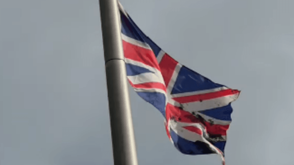 A Union Jack covered in black paint