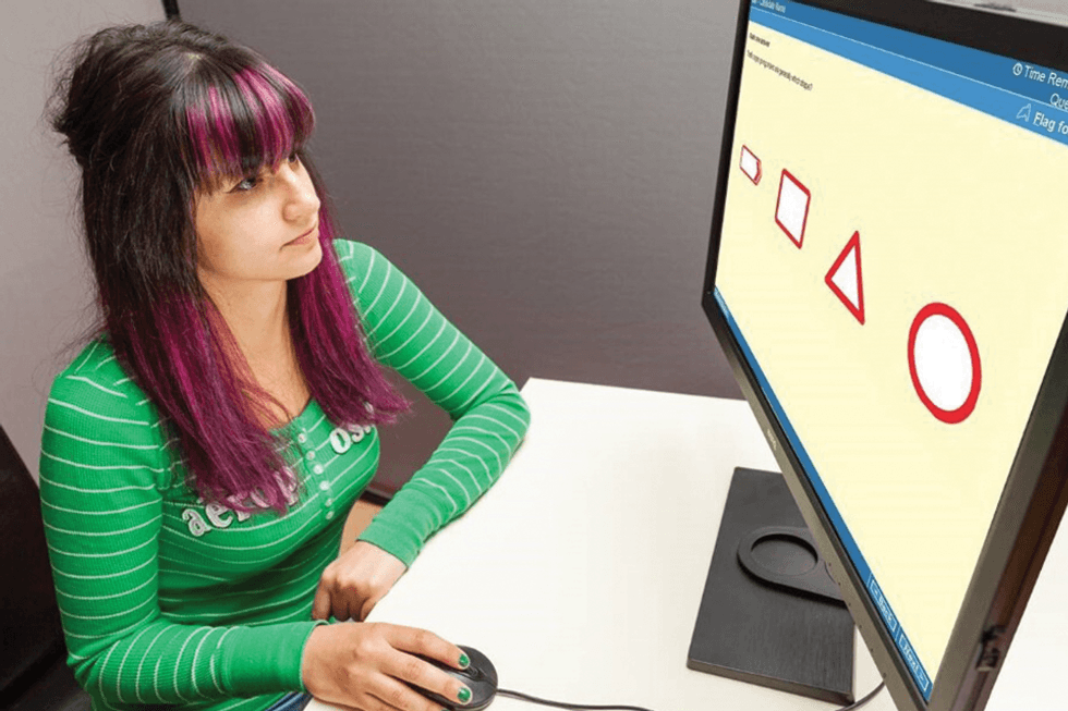 A woman taking a theory test