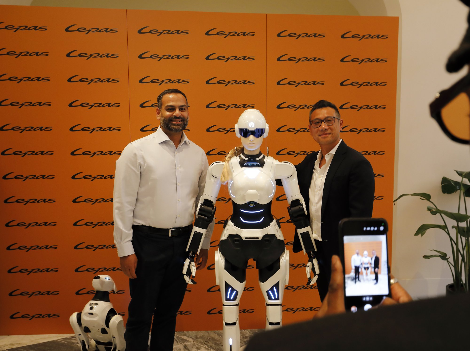 An AiMOGA humanoid robot and its four-legged companion were present at the UK launch of Lepas
