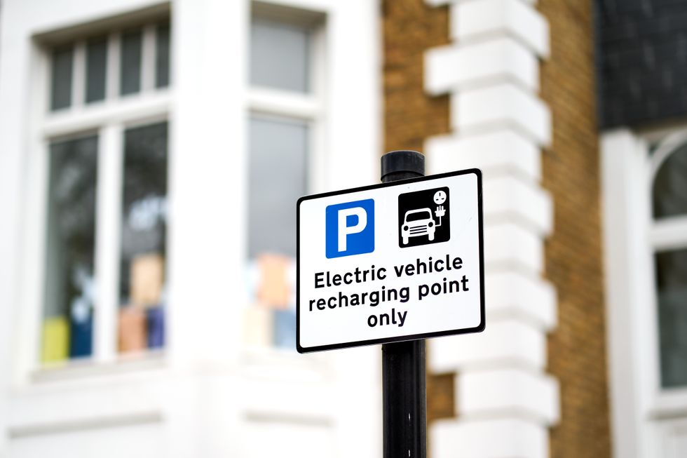 An EV charging sign