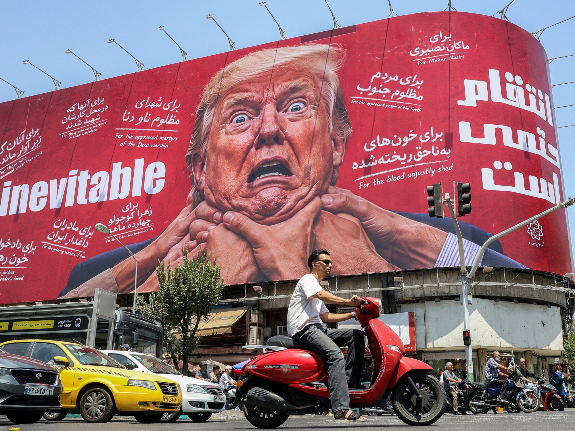 An Iranian propaganda billboard showing hands throttling Donald Trump