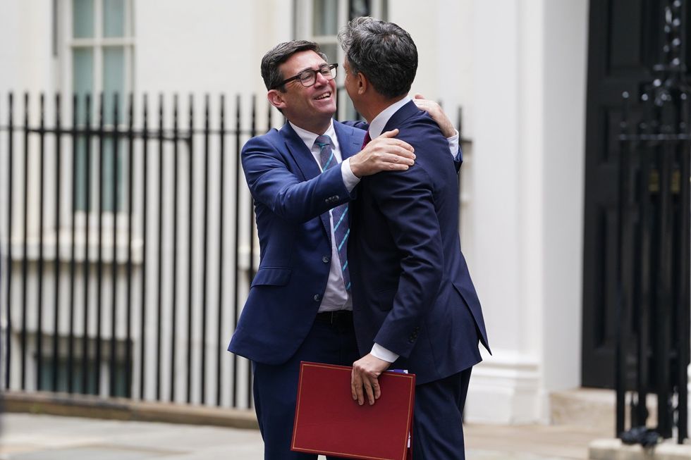 Andy Burnhma and Ed Miliband on Downing Street