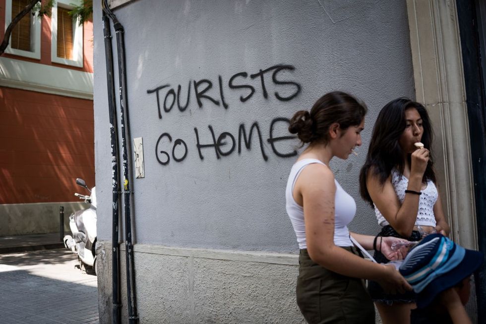 Anti-tourism graffiti