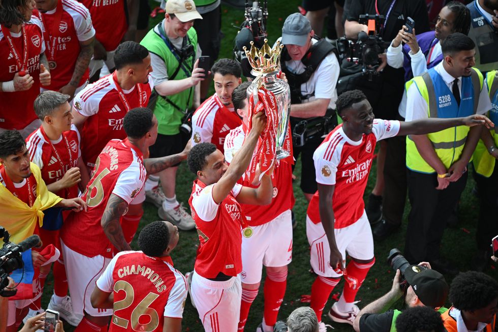 Arsenal players celebrate their Premier League title at Selhurst Park on Sunday