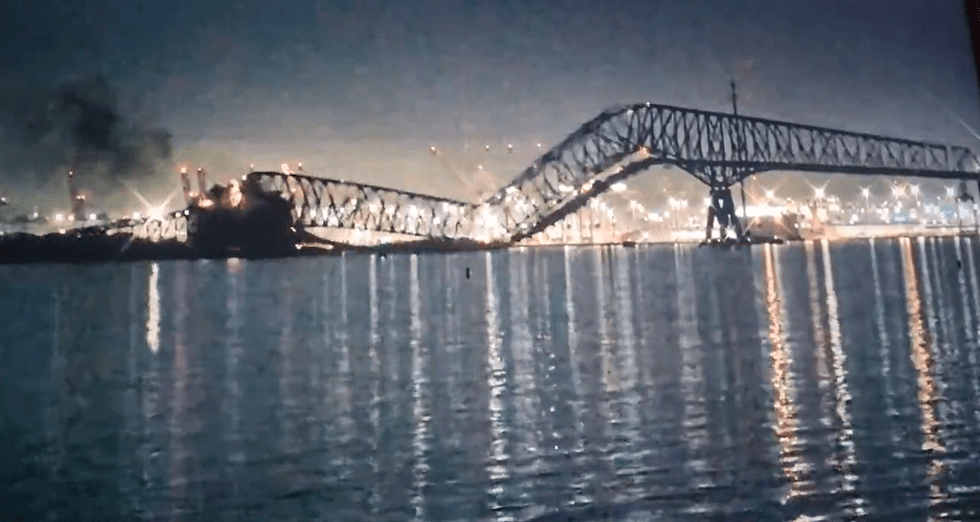Baltimore bridge crashes into river after being struck by large boat