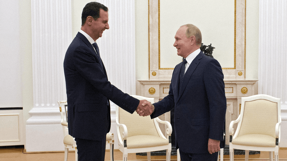 Bashar al-Assad and Vladimir Putin