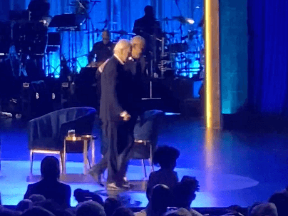 Biden and Obama walking off stage