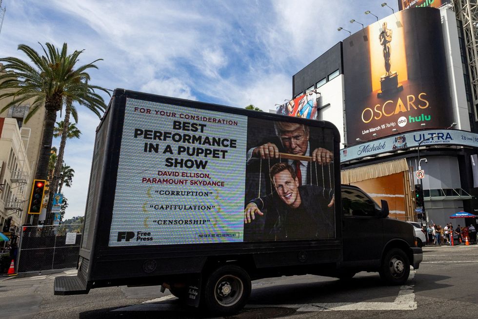 Billboard mocking David Ellison's relationship with Donald Trump