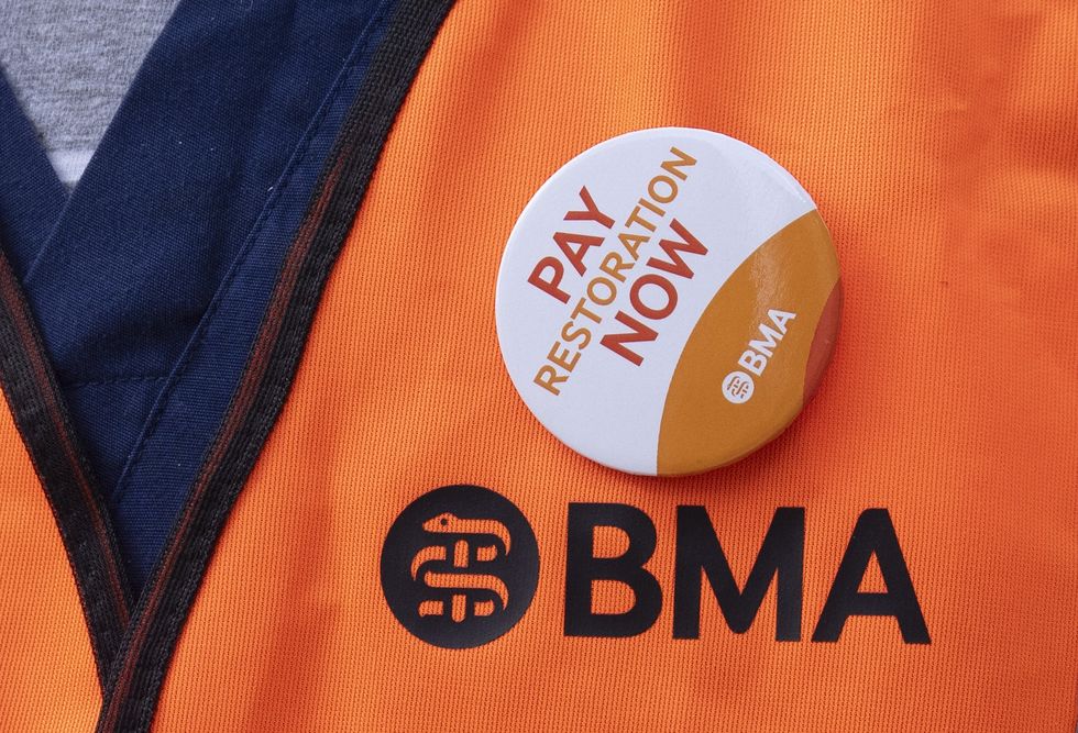 BMA vest and badge