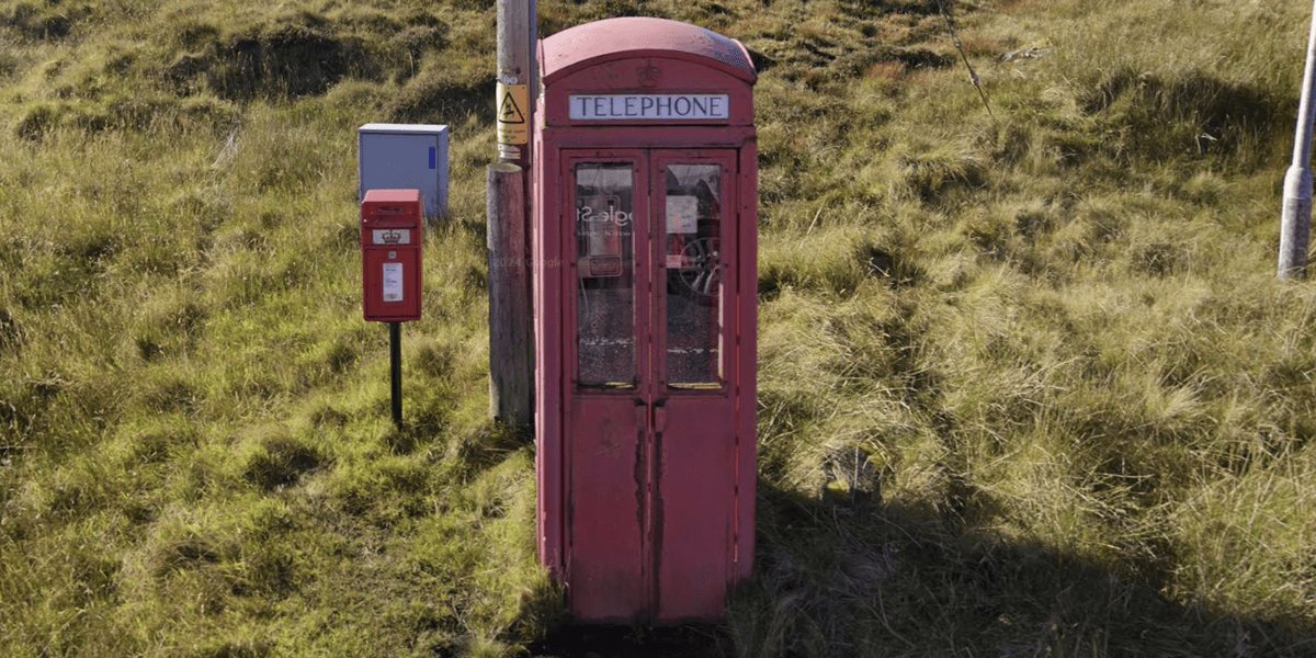 Eccentric Briton completes 1,700-mile round trip to save last red phone box of its kind