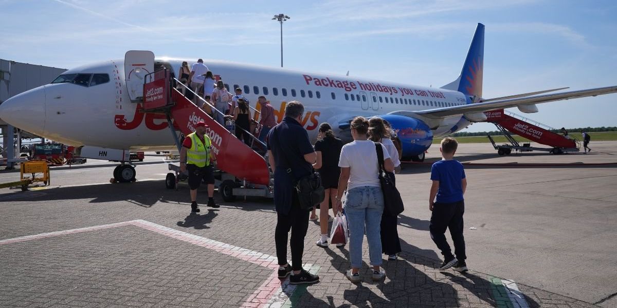 Britons face flight price hikes of up to £400 as Net Zero drive threatens to price families out of holidays abroad