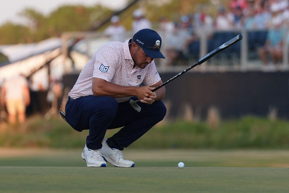Bryson DeChambeau is using a SIK Pro C-Series arm-lock putter