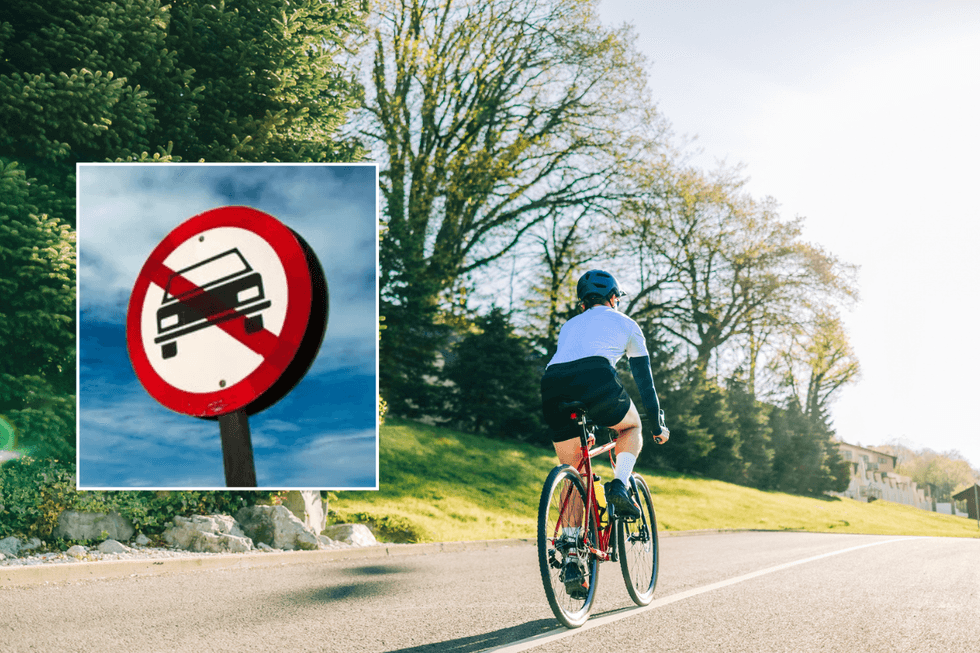 Car ban sign and bicycle