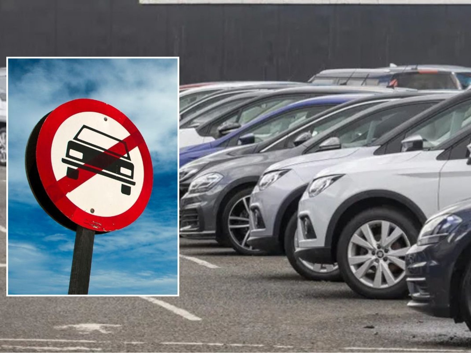 Car ban sign and cars parked