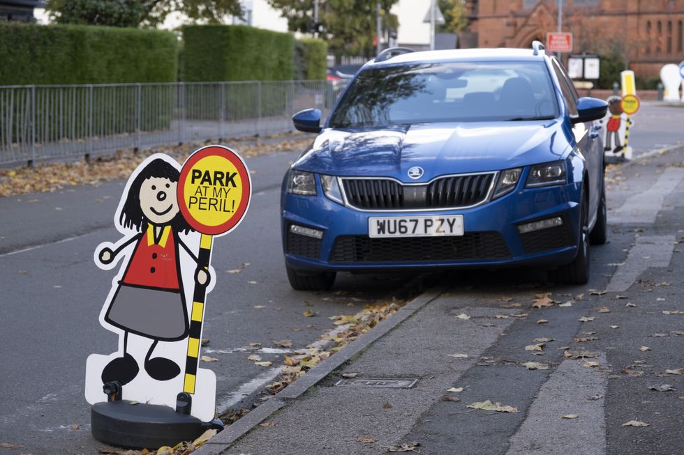 Car parked on the pavement