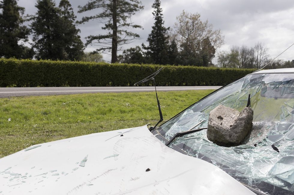 Car smashed with rock (stock)