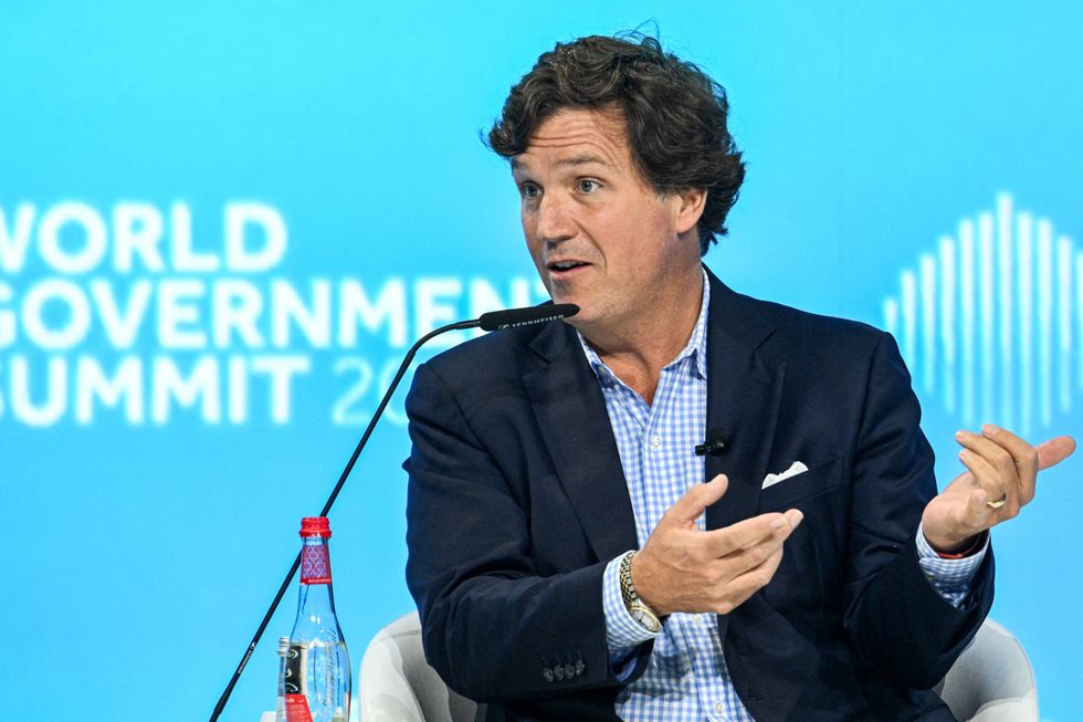 Carlson speaking at the World Government Summit in Dubai