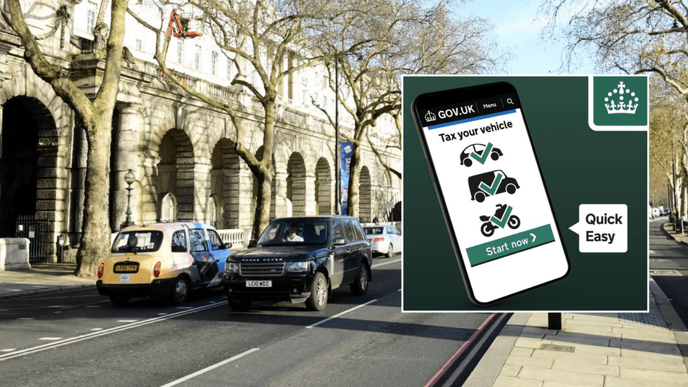 cars on road and tax sign