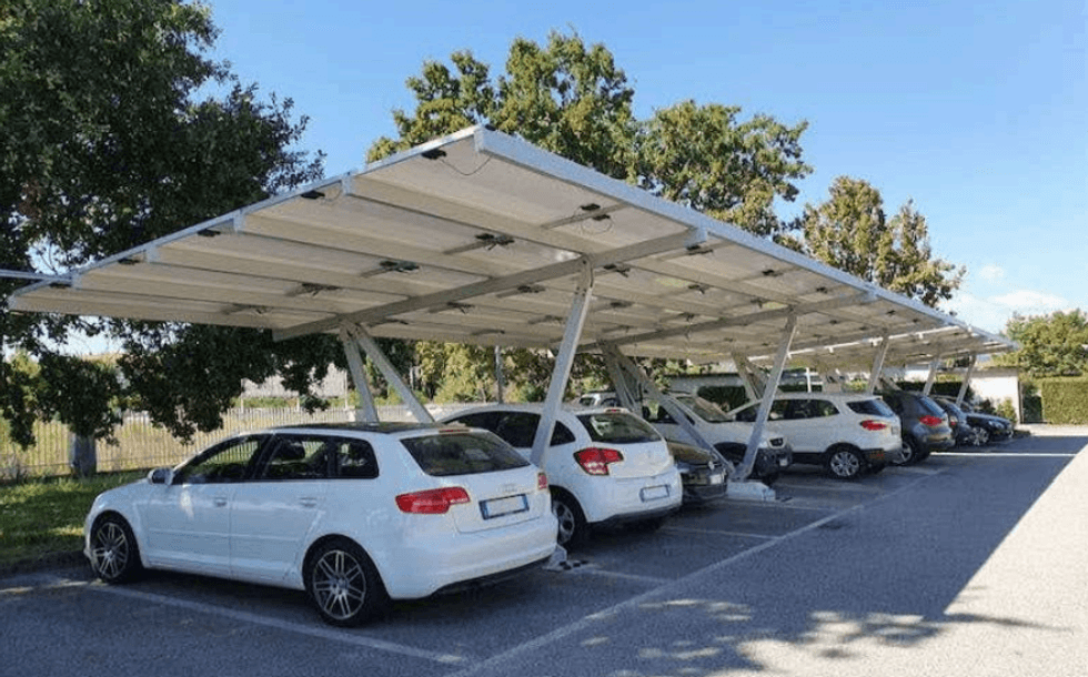 Cars parked under a solar canopy