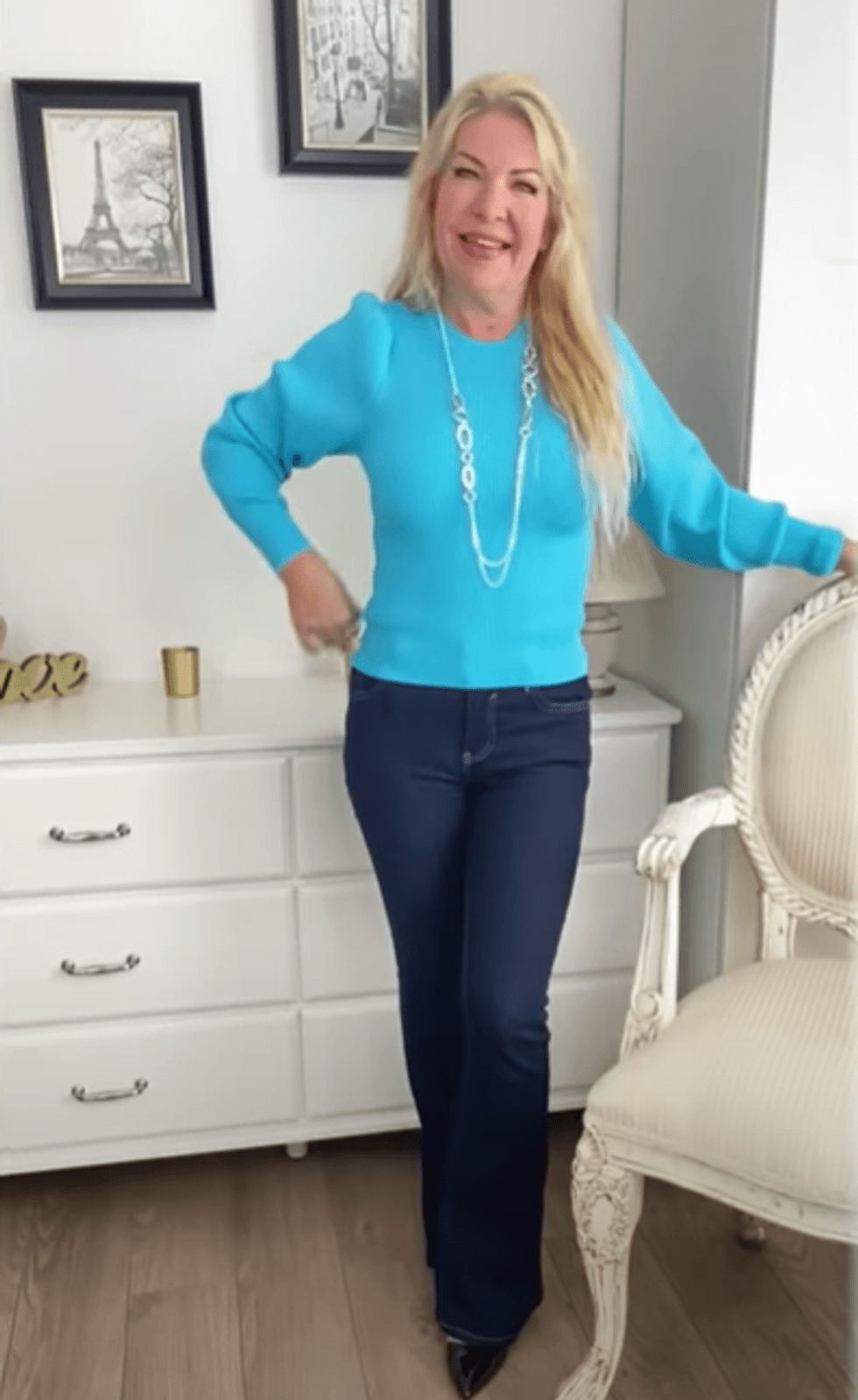 Deirdre from 50 & Fabulous with My Friend Deirdre wearing a blue jumper and dark navy jeans