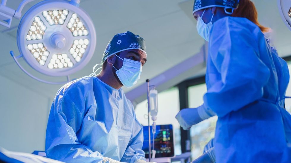 Doctors in a hospital operating theatre