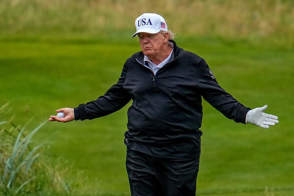 Donald Trump playing golf