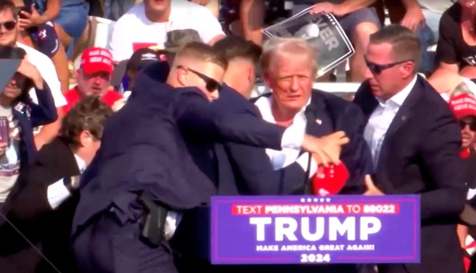 Donald Trump with blood on his face