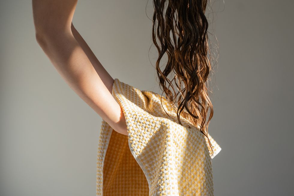 Drying hair with towel