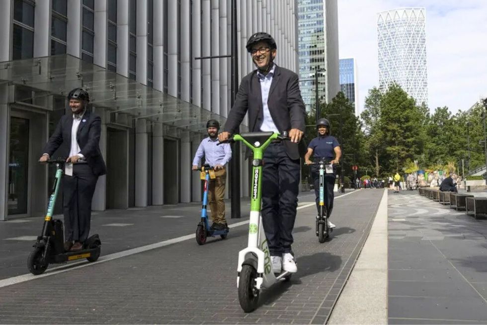 Electric scooters riding through London