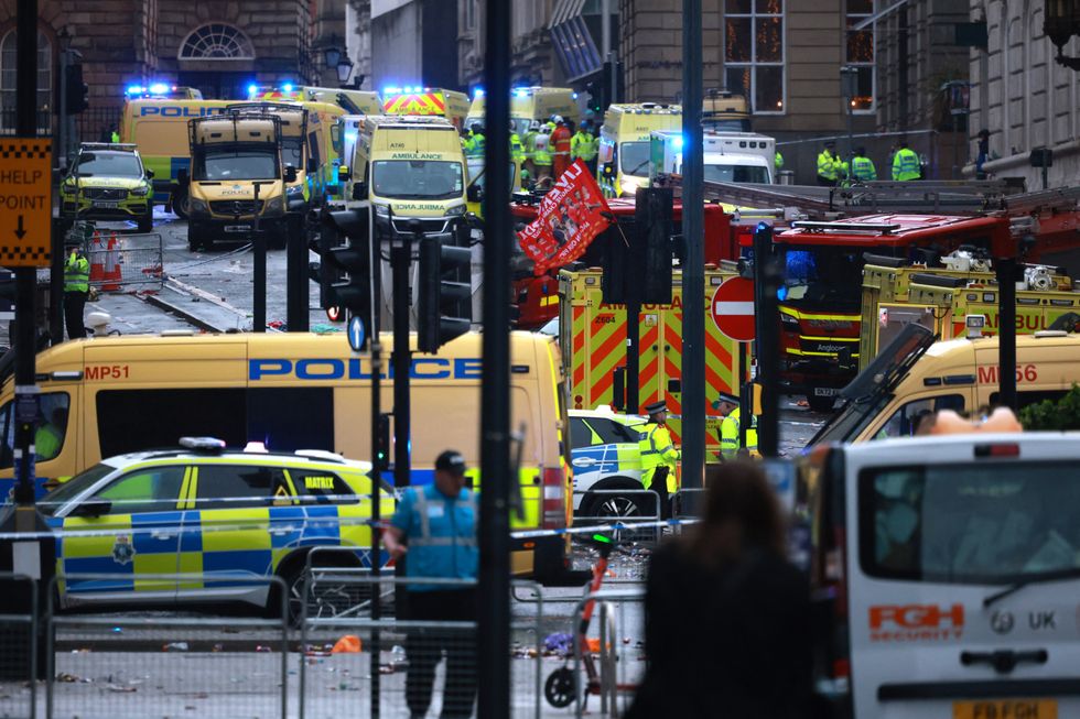Emergency services at the scene after multiple people were hit by a car during the Victory parade\u200b