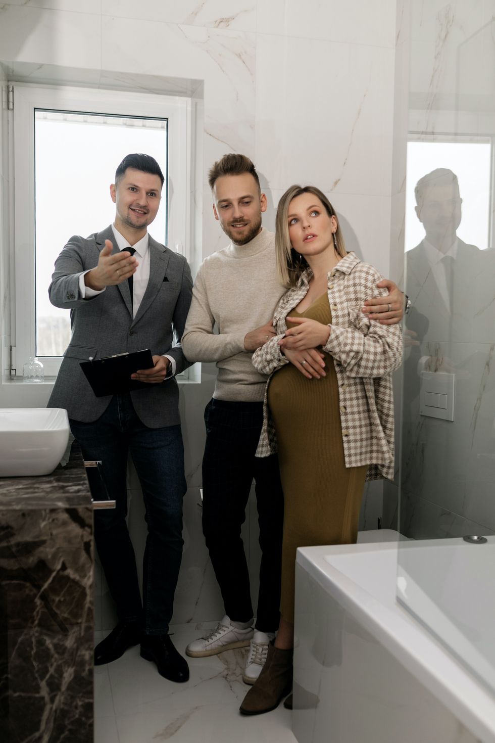Estate agent showing house