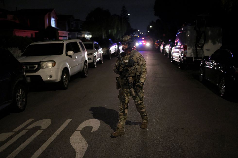 FBI agent outside the residence associated with Cole Tomas Allen in California, the suspected shooter at the annual White House Correspondents' Association dinner in Washington, D.C\u200b