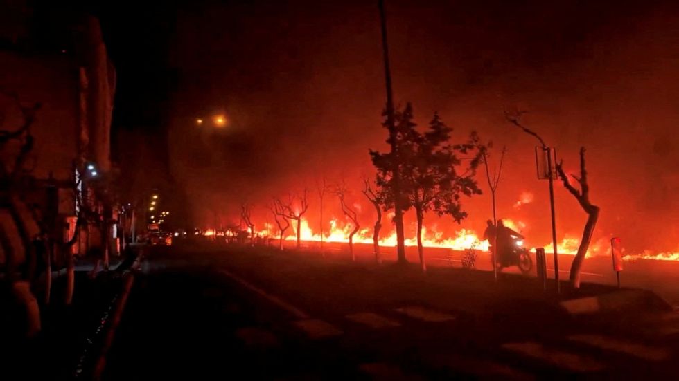 Fire burning along Tehran's Koohsar Boulevard