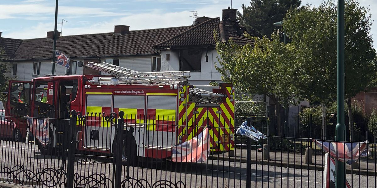 Police launch murder investigation after two people killed in house fire