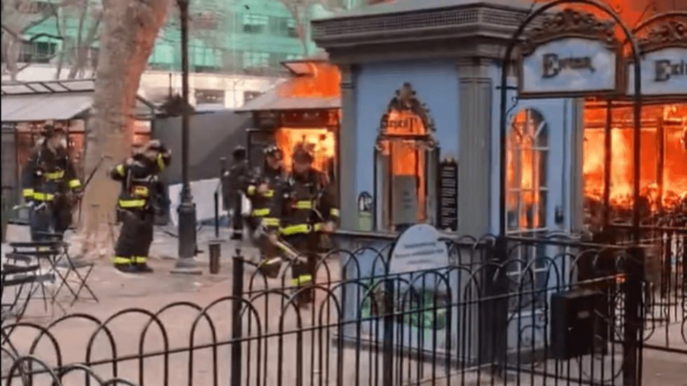 Firefighters and fire at market