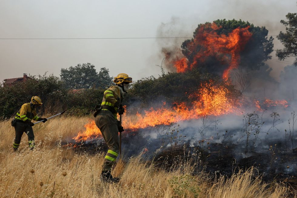 Firefighters in Span wildfire