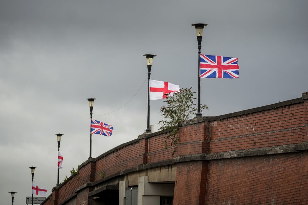 Flags raised on lampposts