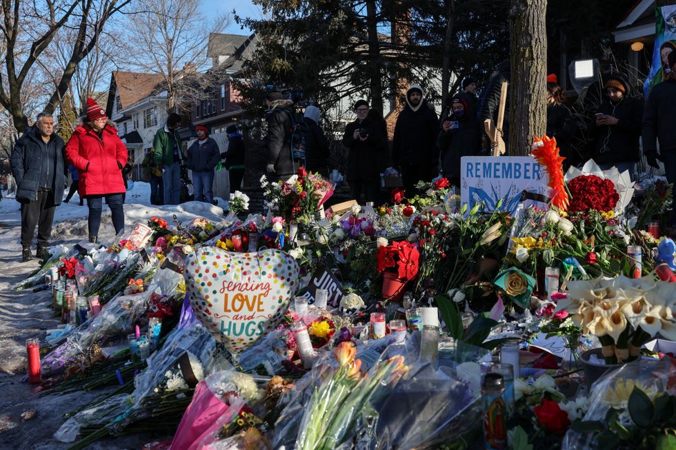 Flowers in tribute to Renee Good