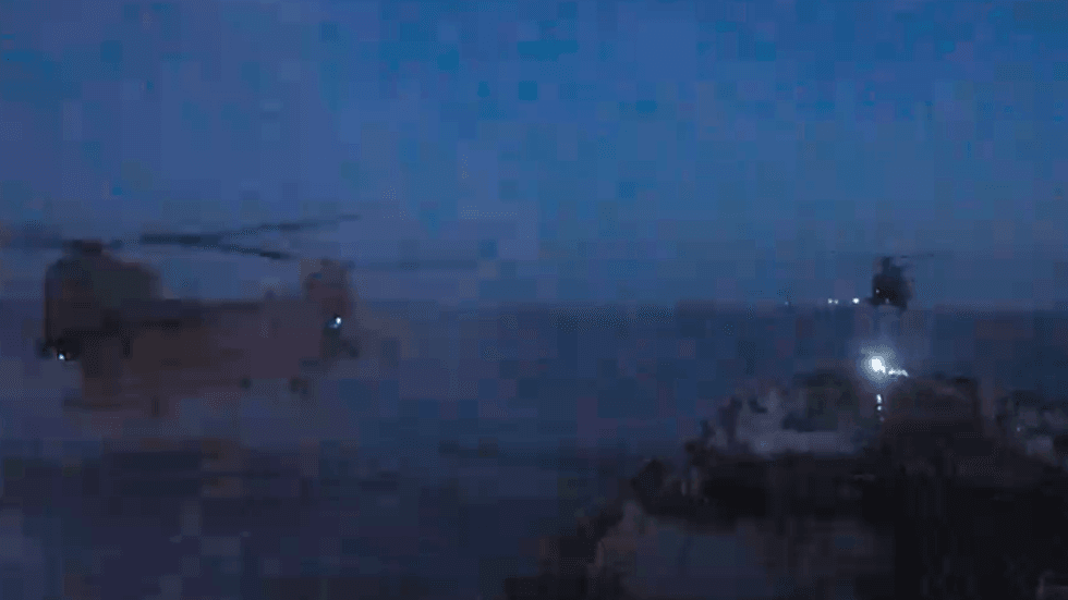 Footage from the operation shows helicopters hovering over the oil tanker in the early hours of the morning